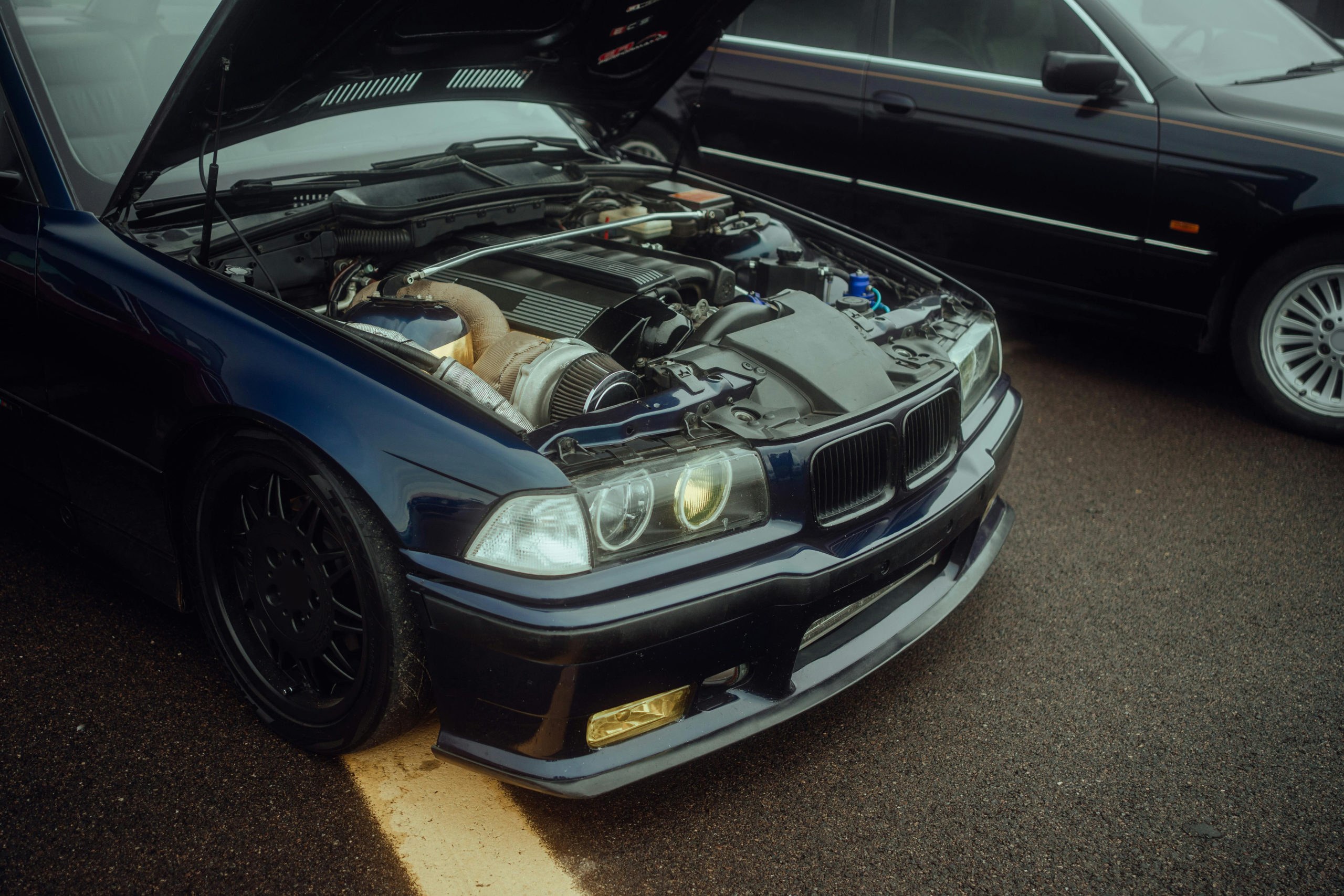 Tuned sedan with hood open